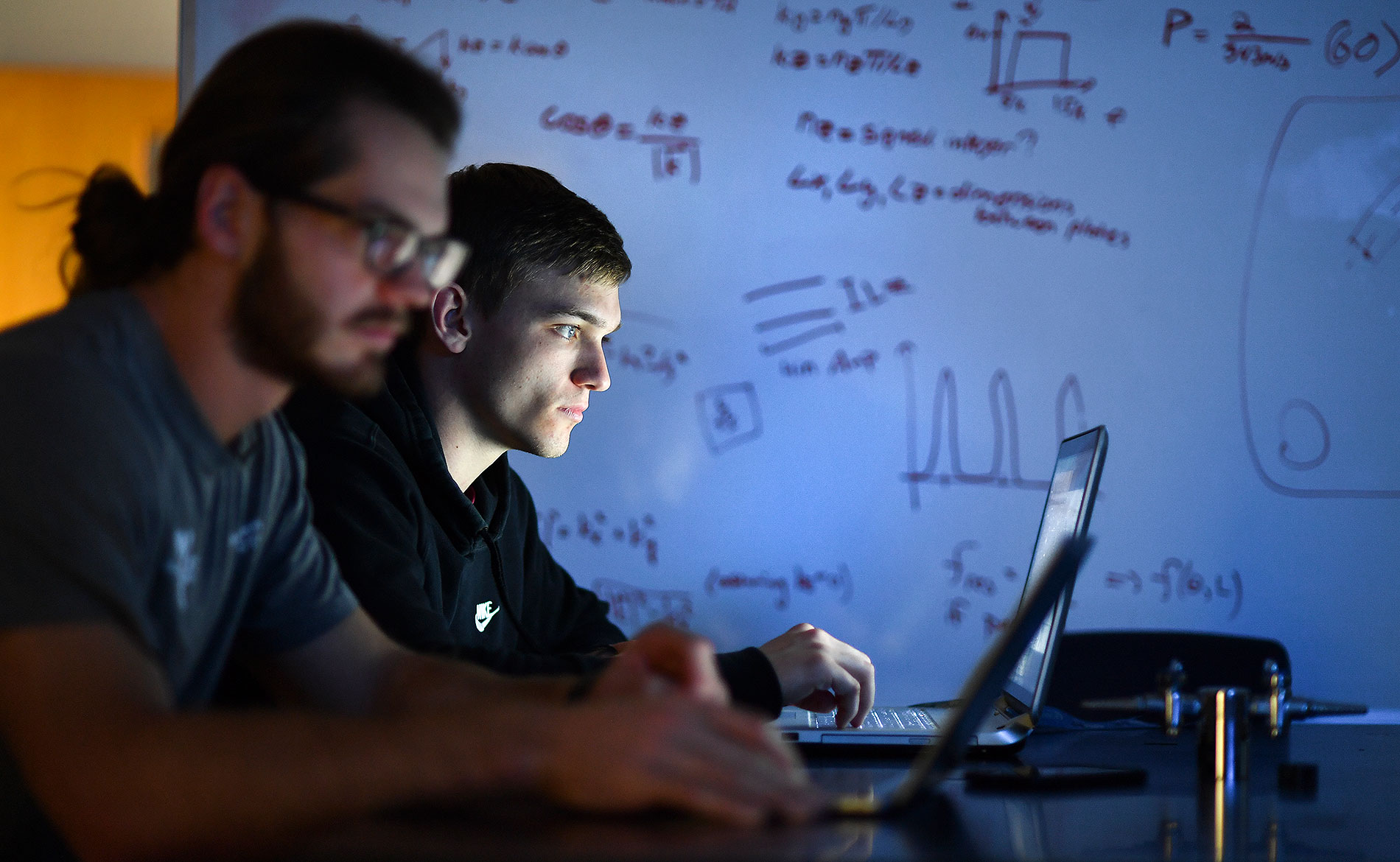 Students studying in the dark