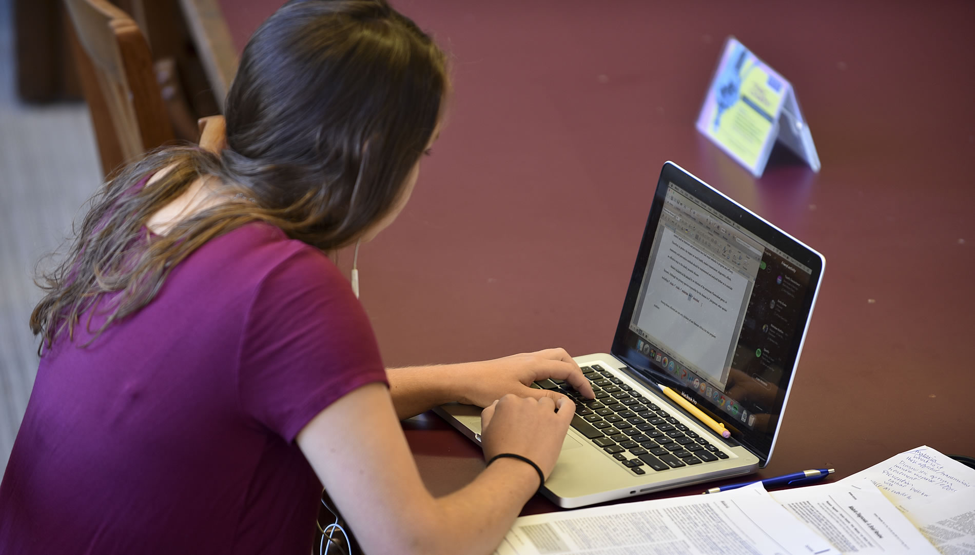 girl studies on laptop