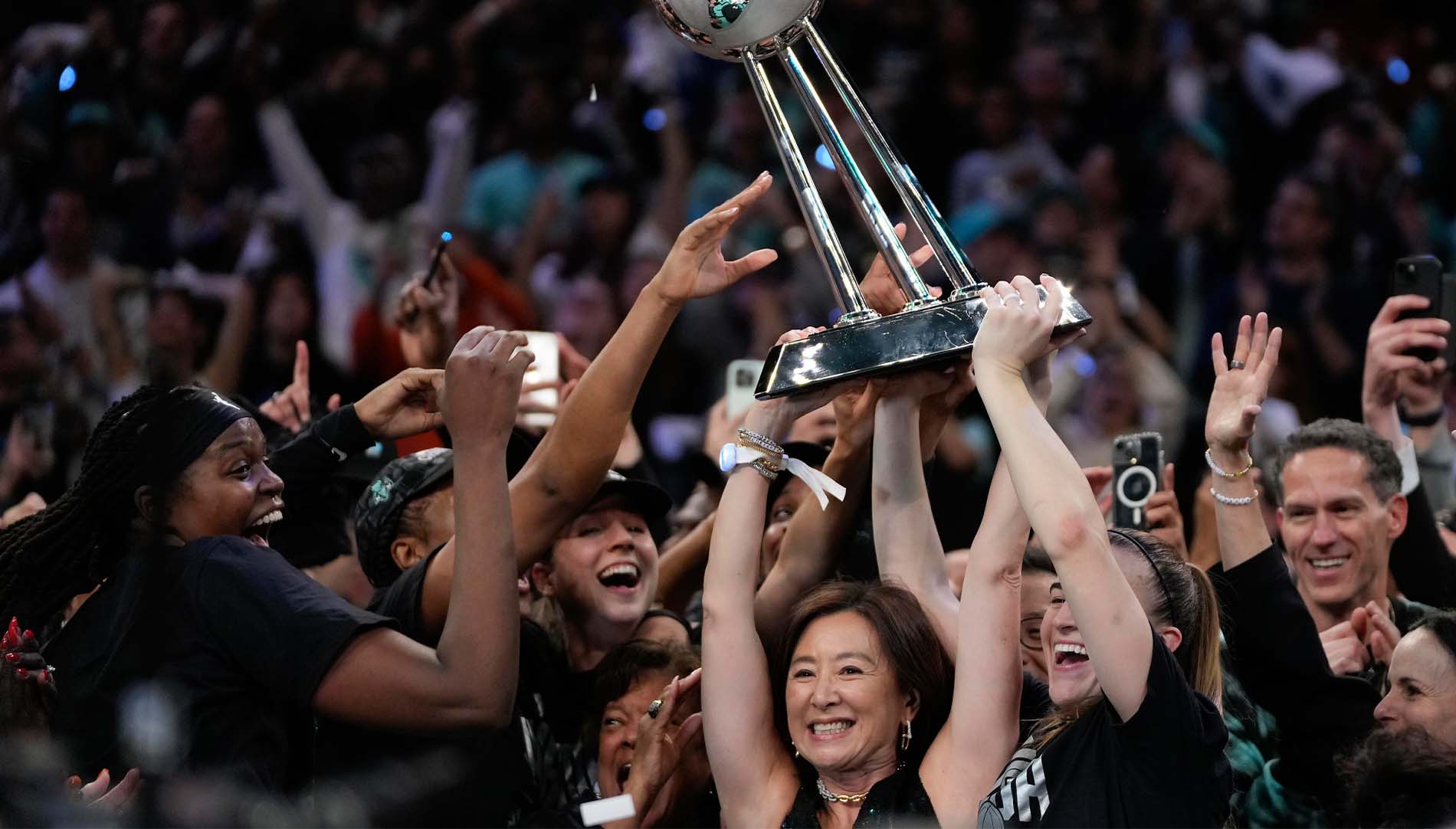 New York Liberty hold up the championship trophy