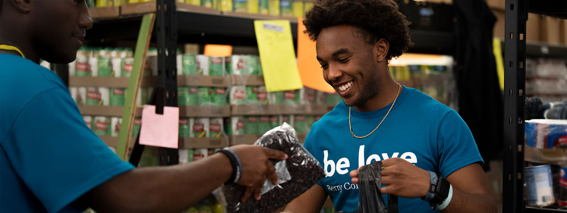 two students packaging food